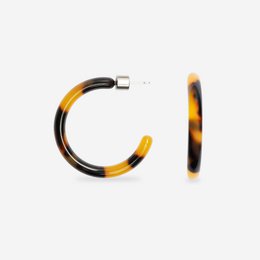 Tortoiseshell hoop earrings with a bold, chic design.