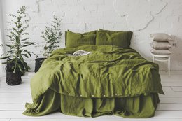 Linen bedding set in various colors and sizes, including mustard, forest green, green moss, dark green, and dusk blue. The set features a soft, textured linen material and is available in single, double, queen, king, and super king sizes.