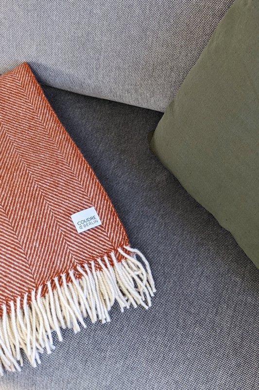 Coperta in lana / coperta coccolosa a spina di pesce in terracotta