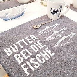 Dækkeserviet smør ved fisken