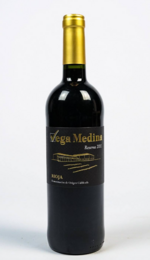 This Rioja red wine from Vega Medina has a deep, rich color and a complex, full-bodied flavor profile. It is made from traditional Rioja grape varieties and aged in oak barrels, resulting in notes of dark fruit, spice, and vanilla.