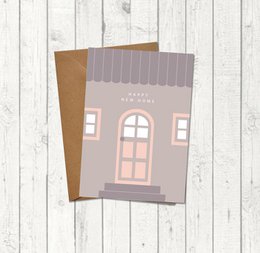  "Greeting card with a simple illustration of a house and the text 'Happy new home'."