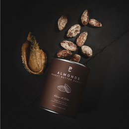 Almond - Peanut Butter Caramel - Mini 60g. A delicious blend of almonds, peanut butter, and caramel in a mini 60g size. The product features a rich, creamy texture and a sweet, nutty flavor.