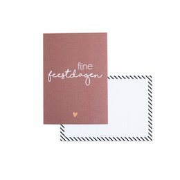 A6 Christmas card with the text "fine festive" printed in white on a pink background. The card is accompanied by a brown envelope.
