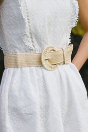  Woven raffia belt with elastic and metal buckle, available in ivory, black, and beige colors. Suitable for casual or formal wear.