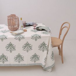 Rectangular tablecloth with green floral pattern, available in small, standard, large, and round sizes.