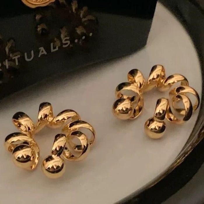 Pièce à oreille de conception de fil unique