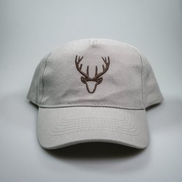 Gray baseball cap with deer antler logo, unisex style.