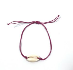 Cowry bracelet fuchsia