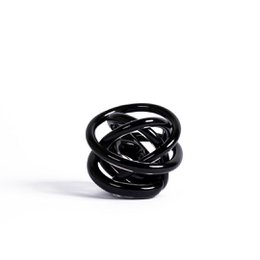 A modern, abstract glass vase in a medium size, available in black, blue, and amber colors.
