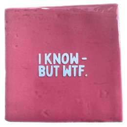A green tile with the text "LET THEM SMELL A POOPIE" in bold pink letters. The tile appears to be a decorative or humorous home accessory.