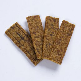  "Guinea fowl meat strips, brown rectangular treats, pet food snacks"