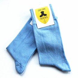 Blue socks with a yellow label that says "Oh Oh Socks"