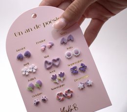 Box of 12 Ceramic Earrings — A Year of Poetry parma