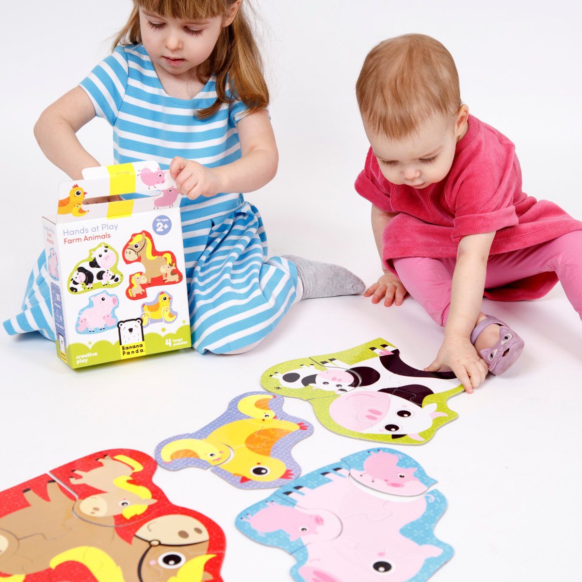 Hænder på Play Farm Animals 2+