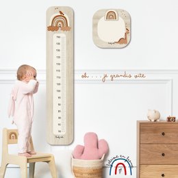 Colorful terracotta rainbow-themed wall decor for a kid's room, featuring a thermometer and abstract shapes in earthy tones.