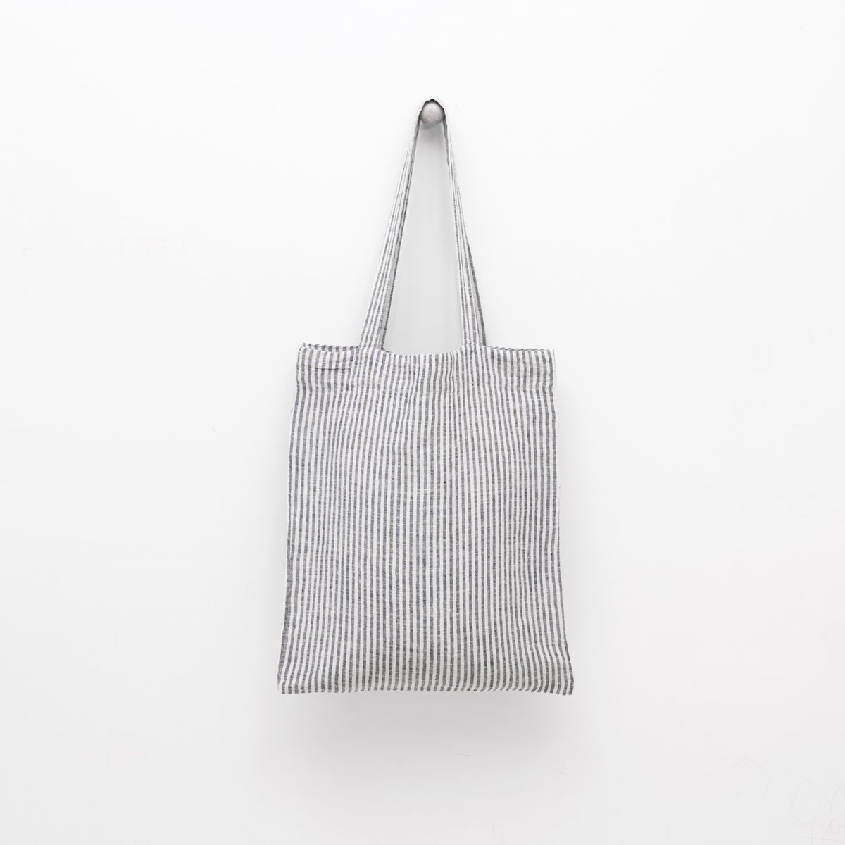 Tynd sort strip linned taske