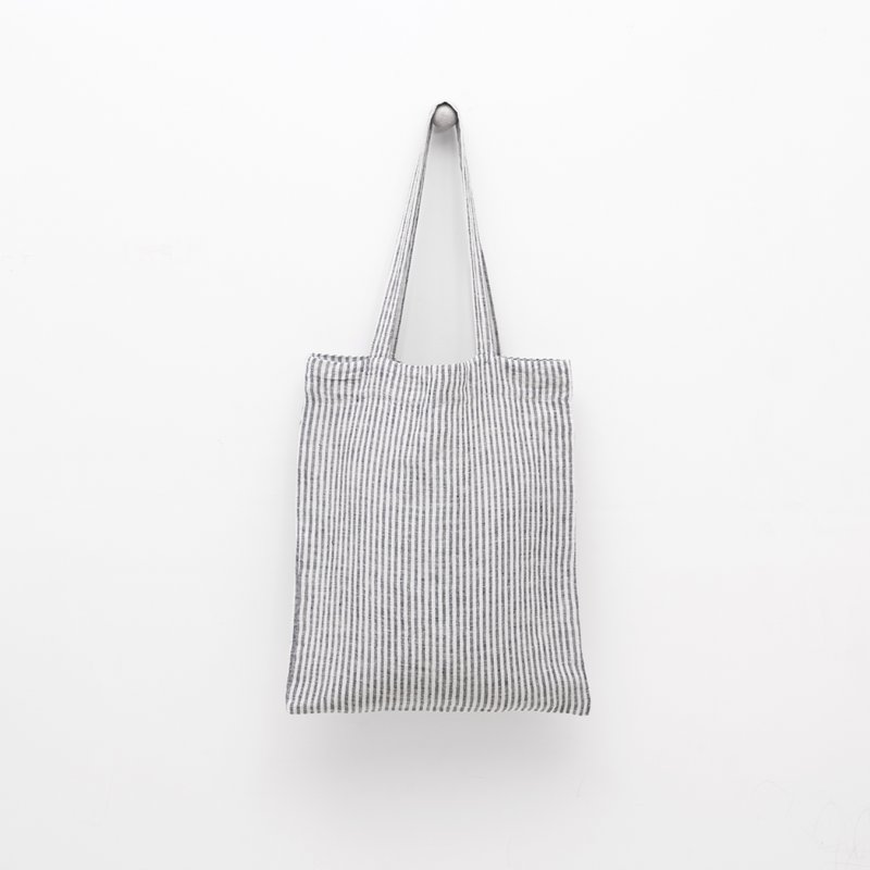 Tynd sort strip linned taske