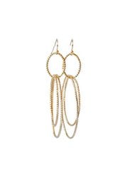 Gold-plated statement earrings with oval-shaped hoops and dangling chains.