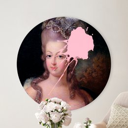 A round wall decor featuring a portrait of a woman with an elaborate hairstyle and floral accents, suitable for a living room or bedroom.