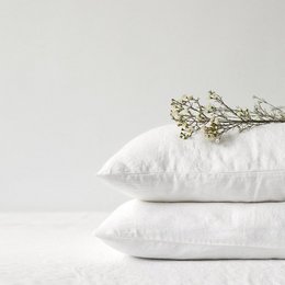 White linen pillowcase, available in various sizes for standard, northern Europe, euro sham, EU IKEA, DE King, EU Standard, Southern Europe, DE Small, UK King, Scandinavian, and EU King beds. Made of soft, breathable linen material.