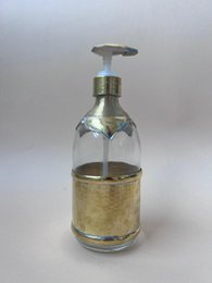 Large glass soap dispenser pump bottle, clear transparent container, metallic silver pump top, liquid soap holder.