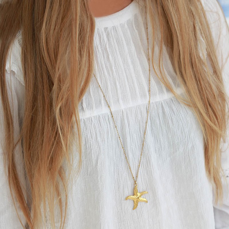 Long golden necklace starfish