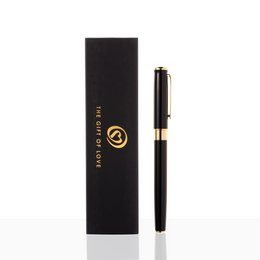 Black gel pen with gold accents, suitable for writing and drawing.