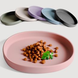  The image shows a set of colorful silicone feeding bowls in various pastel shades, including rose, green, blue, graphite gray, lilac, and stone gray. The bowls appear to be designed to be pet-friendly, with a "whisker friendly" feature mentioned in the product title. The image also shows a pink plate with some food items on it, such as what appears to be roasted chickpeas or a similar snack.

Based on the information provided, the relevant description for this product would be:

"Silicone feeding bowls in a variety of pastel colors including rose, green, blue, graphite gray, lilac, and stone gray. Designed to be whisker-friendly for pets. Durable, non-slip, and easy to clean silicone construction."

This description covers the key details about the product, including the materials, colors, and features, which would be relevant for a semantic search related to pet feeding bowls.