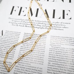 PAPERCLIP - Prostokątny naszyjnik ze spinacza do papieru ze szczotkowanej stali w kolorze złotym