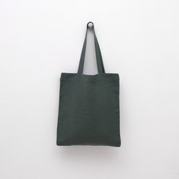Forest green linen tote bag with sturdy handles for everyday shopping and errands.
