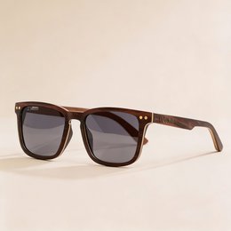 Wooden sunglasses with polarized UV400 protection and ebony frame. Available with cork or bamboo case.