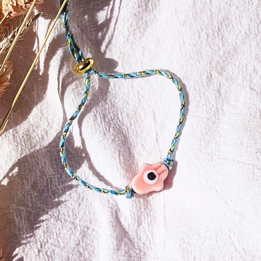 Bracciale Hamsa intrecciato a mano rosa