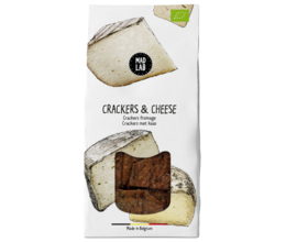Crackers and cheese snack pack. Rectangular crackers with a wedge of cheese. Savory and satisfying.
