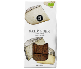 Crackers and cheese snack pack. Rectangular crackers with a wedge of cheese. Savory and satisfying.