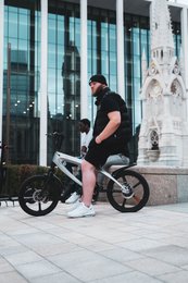 The Cruzaa Pedal-assist Bluetooth Electric Bike Carbon Black