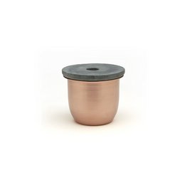 Small copper container with soapstone lid, suitable for storage.