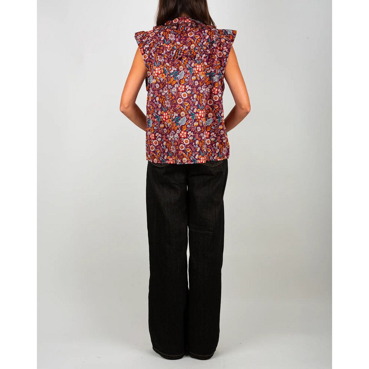 Blusa de mujer morris sin mangas con volantes