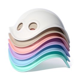 A set of 6 colorful, stackable Bilibo sensory toys in various pastel shades. The Bilibos have a unique wave-like shape and are designed to encourage open-ended play and sensory exploration.