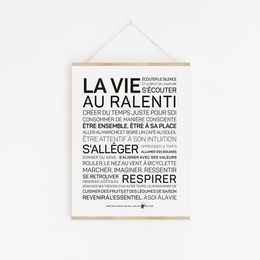 Minimalist poster with text in French, featuring the phrase "La vie au ralenti" (Life in slow motion). The poster has a simple, clean design with black and white colors.