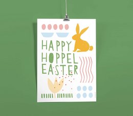 Vibrant Easter poster with a silhouette of a hopping rabbit, colorful eggs, and the text "Happy Hoppel Easter" in a playful font. The poster features a cheerful, whimsical design perfect for spring and Easter decor.