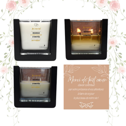 Scented Christmas candle with Rudolph the red-nosed reindeer decoration, featuring a festive "Joyeux Noel!" text.