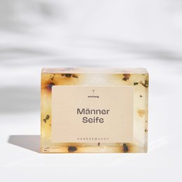 A natural, handcrafted soap bar for men, featuring a blend of natural ingredients like nettles and hemp for a gentle, moisturizing cleanse.