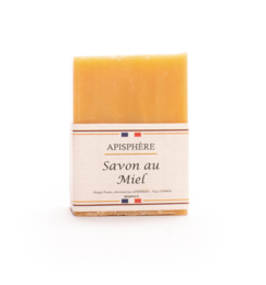 Honey-scented soap bar, made with natural ingredients. Rectangular shape, golden yellow color.