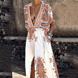 Vintage boho long dress, deep V-neckline, floral paisley print, short sleeves, available black white pink