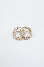 Fin messing broche