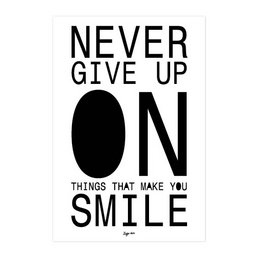 A black and white poster with the text "NEVER GIVE UP ON THINGS THAT MAKE YOU SMILE" in a bold, minimalist design. The poster is suitable for wall art or home decor, providing an inspirational message to never give up on the things that bring you joy and happiness.