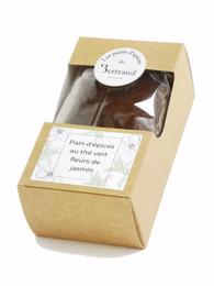 Gingerbread cookie with green tea and jasmine flowers, a delicate and aromatic treat.