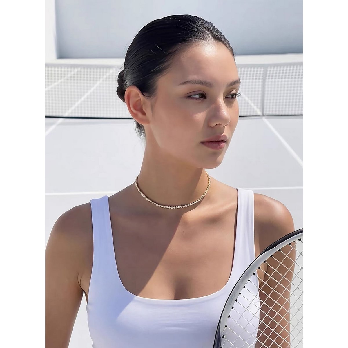 Tijdloze Rivière-chokerketting met diamantlook