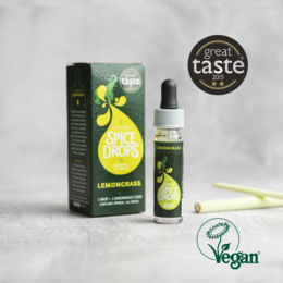 Lemongrass natural extract, spice drops, and oil in an award-winning product. The product is vegan and has a great taste, as indicated by the "Great Taste" award logo.